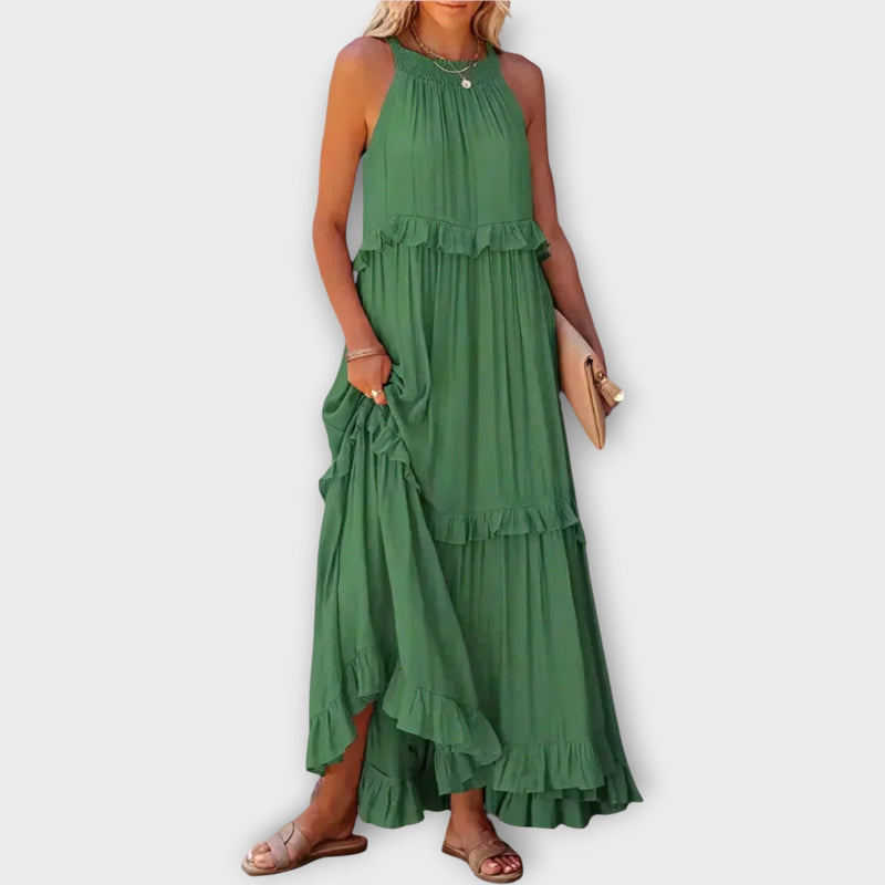 Abito con spalline sottili e linea elegante