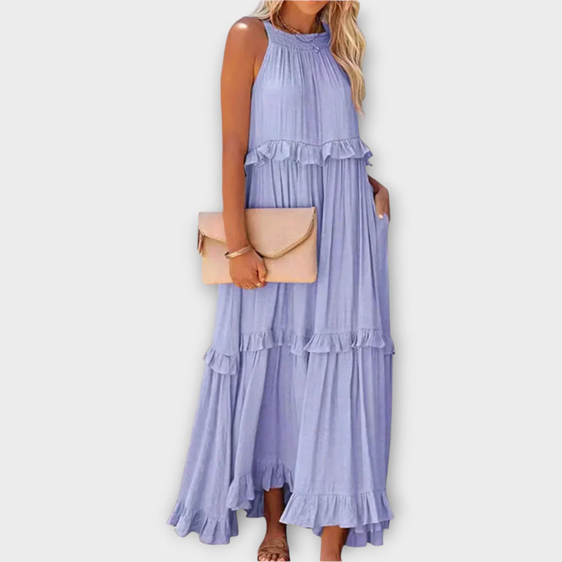 Abito con spalline sottili e linea elegante