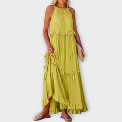 Abito con spalline sottili e linea elegante
