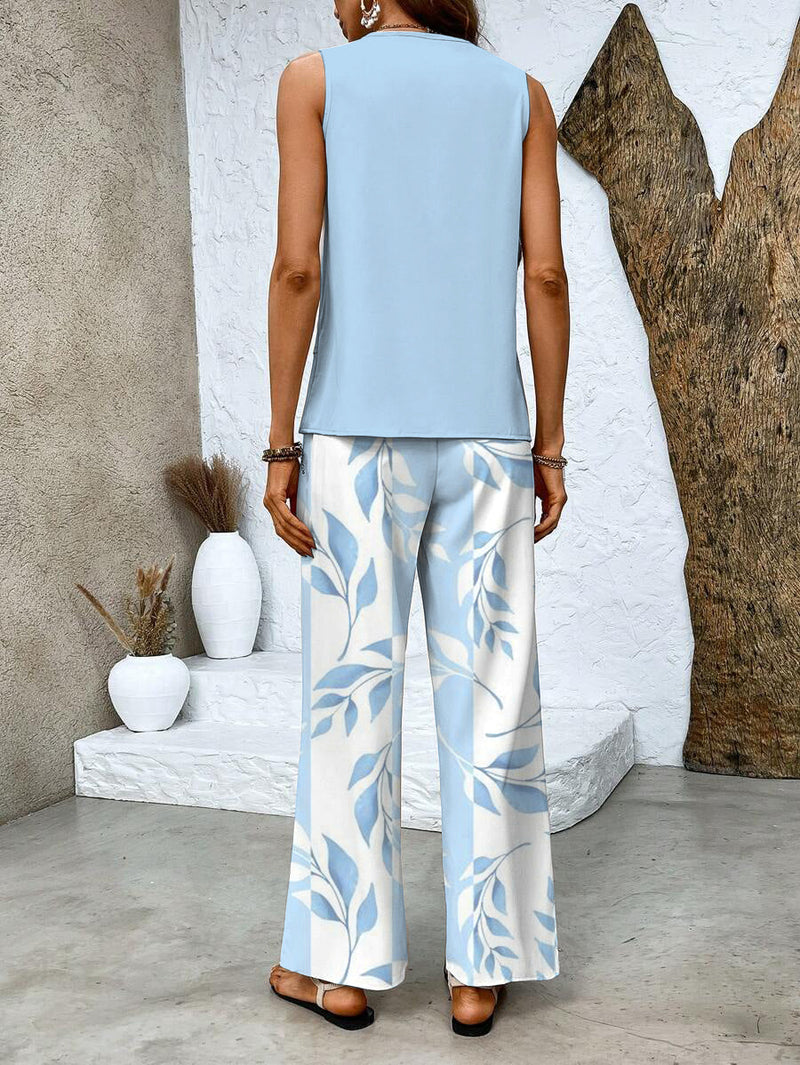 Alba | Completo elegante con top e pantaloni floreali