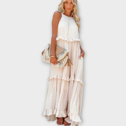 Abito con spalline sottili e linea elegante