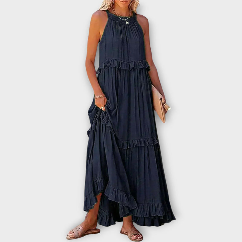 Abito con spalline sottili e linea elegante