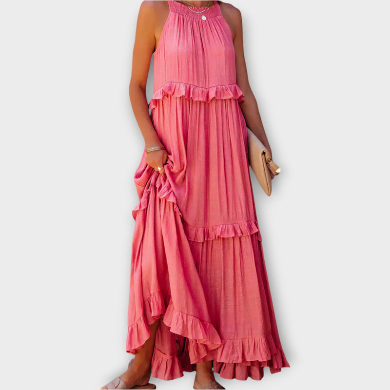 Abito con spalline sottili e linea elegante