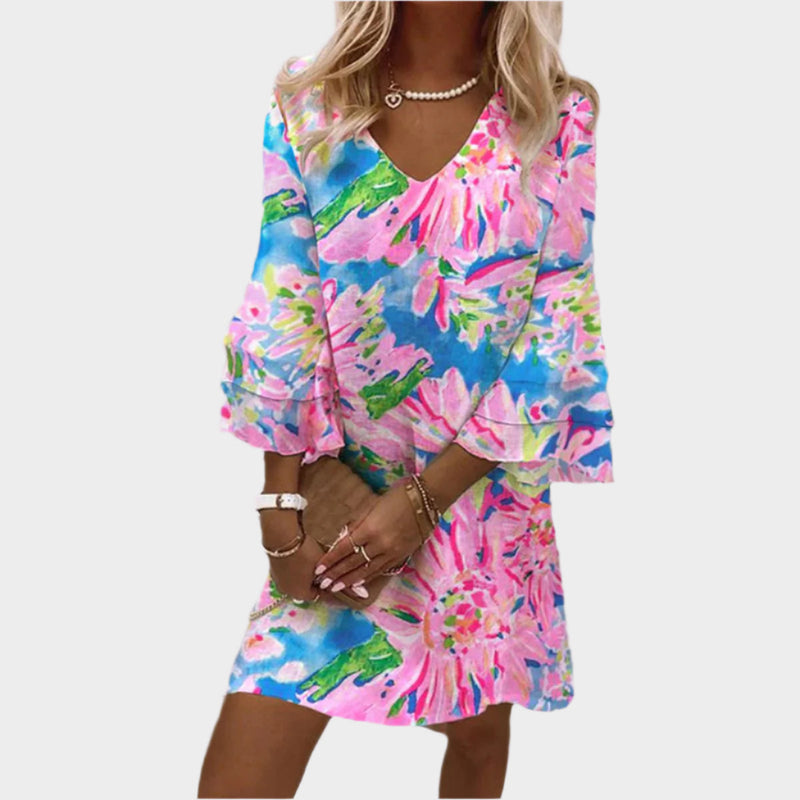 Elegante minivestido rosa con mangas curvas