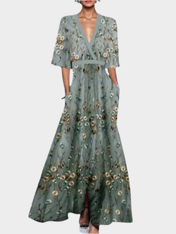 Elegante abito floreale con cintura