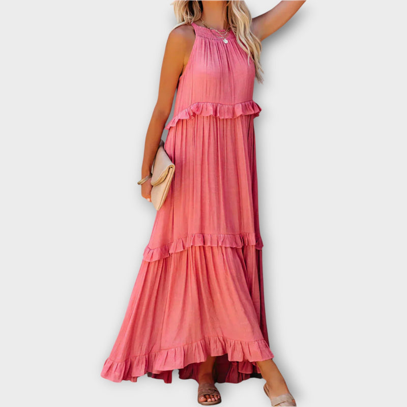 Abito con spalline sottili e linea elegante