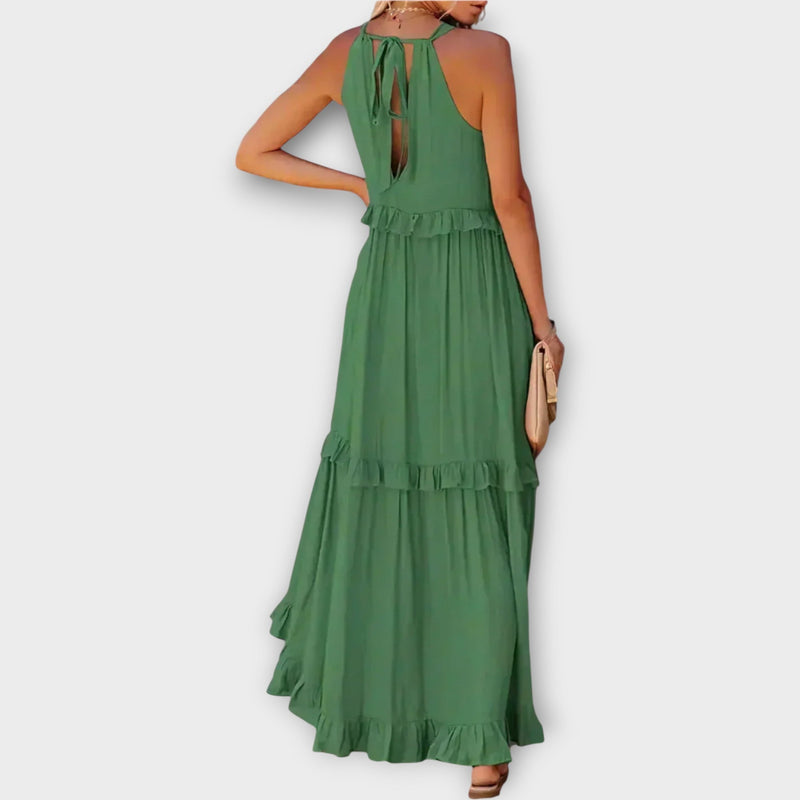 Abito con spalline sottili e linea elegante