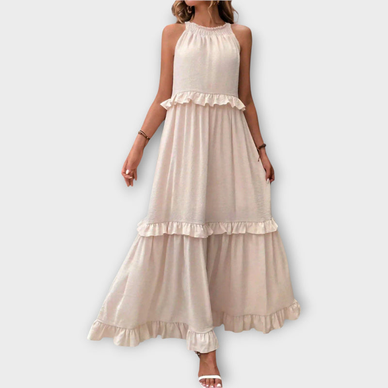 Abito con spalline sottili e linea elegante