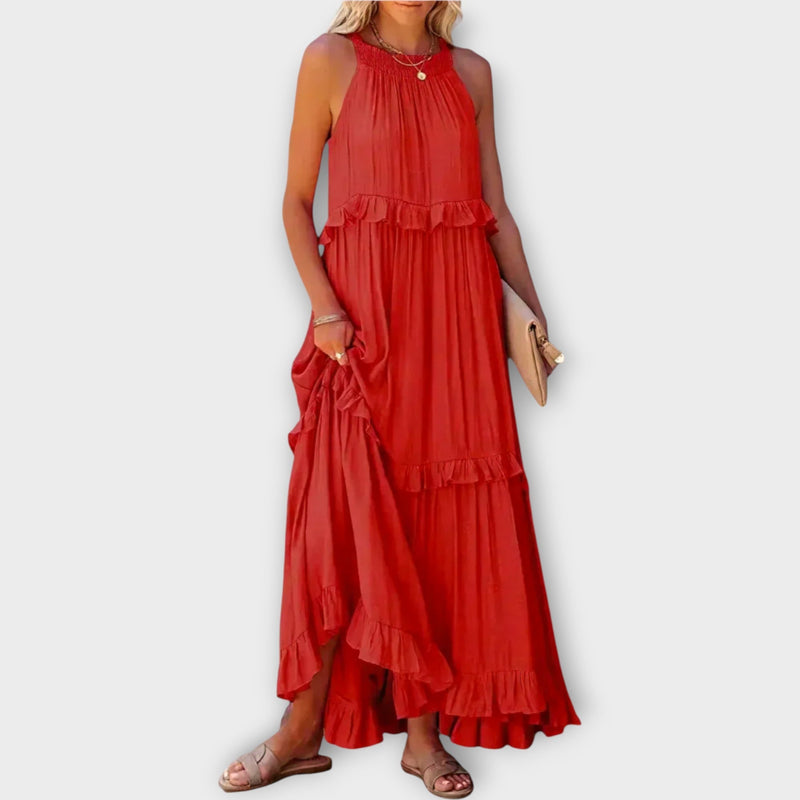 Abito con spalline sottili e linea elegante