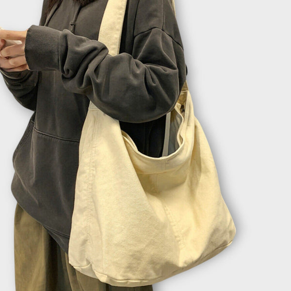 Borsa a tracolla con soluzione